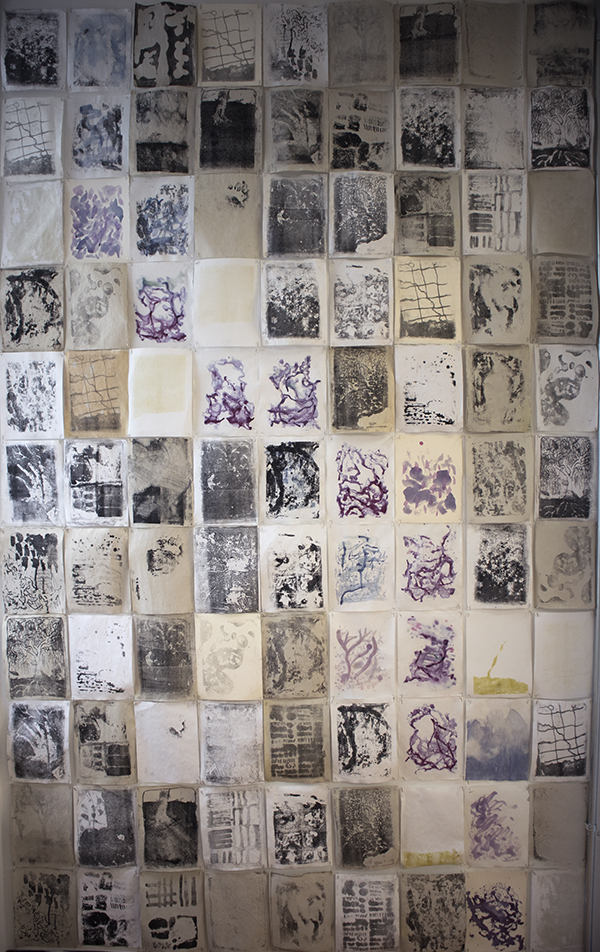 99 abstract prints in black, white and purple.